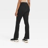 Women's Crossover V-waistband Flare Leggings - A New Day™ Black