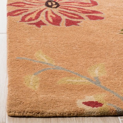 Handmade Floral Elegance Round Blue Wool Rug, 47 in