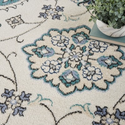 Ivory Blue 10' x 14' Synthetic Rectangular Rug