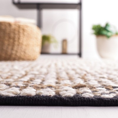 Handmade Black and Ivory Wool Flat Woven Area Rug