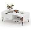 Coffee Table, 41.34" Wooden Coffee Table with Storage Cabinet, Two-Tier Design, Wave-Style Sliding Doors - 2 of 4