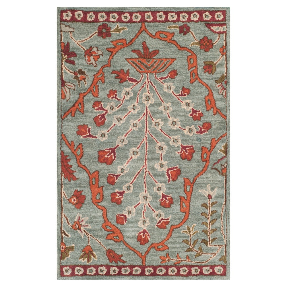 Blue/Rust Botanical Tufted Accent Rug - (2'6inx4') - Safavieh