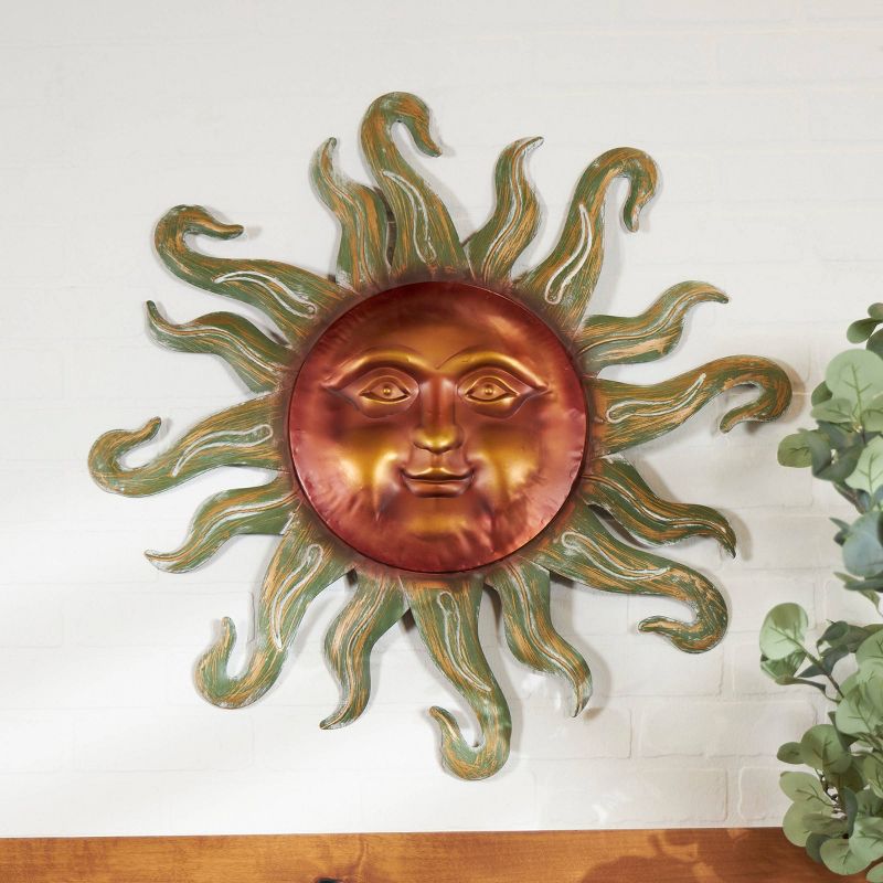 Metal Sun Wall Decor with Smiling Face and Curved Rays Copper - Olivia & May, 1 of 6