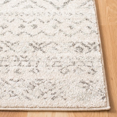 Ivory Boho-Chic Hand-Knotted Synthetic Area Rug