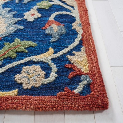 Handmade Blue and Rust Wool Tufted Area Rug 4' x 6'