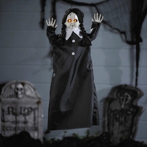 27 1/2" Animated Hanging Cracked Face Doll with Black Dress Halloween Decoration - 1 of 2