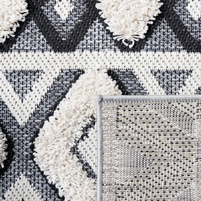 Ivory and Black 8' x 10' Synthetic Rectangular Rug