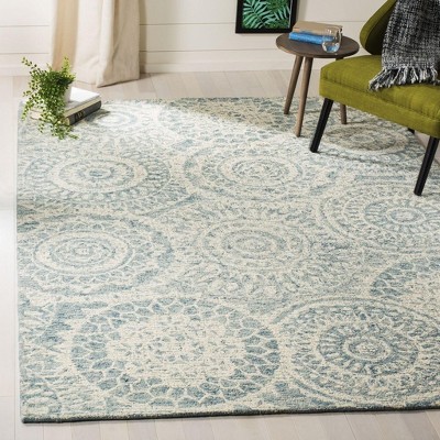 Ivory and Blue Abstract Handmade Wool 6' x 9' Area Rug