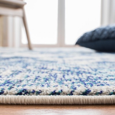 Ivory and Blue Distressed Boho Chic 8' x 10' Area Rug