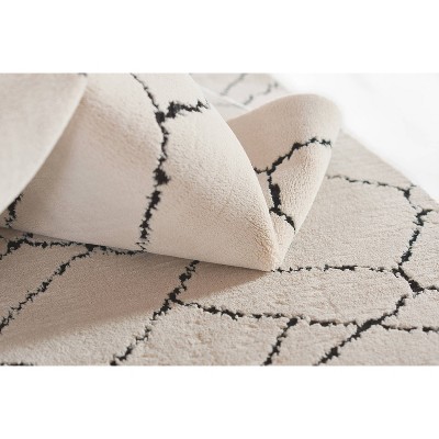 Ivory and Black Rectangular Synthetic Area Rug, 2' x 3'