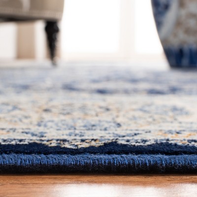 Handmade Ivory and Navy 5' x 7' Rectangular Viscose Area Rug