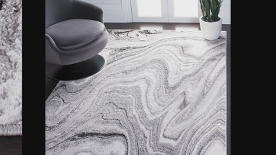 Amelia Light Grey and Ivory Synthetic Abstract Area Rug - 4'5" x 6'5"