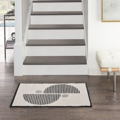 Ivory & Black Geometric Synthetic 6' x 9' Easy-Care Rug