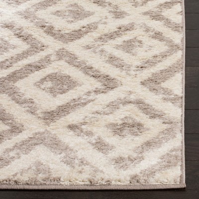 Luxe Off-White Round Synthetic Easy-Care Area Rug, 6'7" x 9'2"