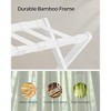 SONGMICS Bamboo Luggage Rack Foldable Suitcase Stand with Fabric Storage Shelf - 3 of 4