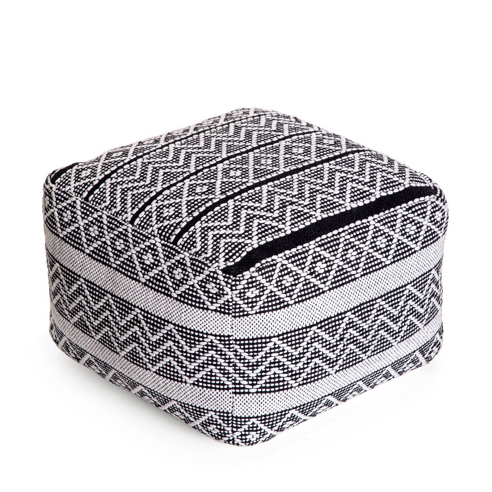 Chouteau Pouf  - Anji Mountain Versatile. Comfortable. Functional. Poufs transform a nice room into something better by providing a pop of style and sprinkle of texture. Whether being used in a seating configuration or just serving as a comfortable ottoman to kick your feet up on, these poufs make your home better. In addition to the handmade high quality, these pieces are filled in the U.S.A with premium, expanded polypropylene beads. This fill provides tremendous durability in keeping the item shape while delivering a consistent soft yet firm every time. Color: Black/Ivory. Pattern: Abstract.