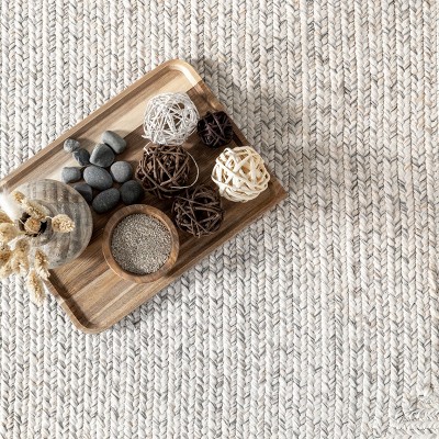 Handmade Ivory Braided 4' x 6' Oval Synthetic Area Rug
