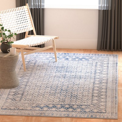 Ivory and Light Grey Synthetic Reversible Area Rug