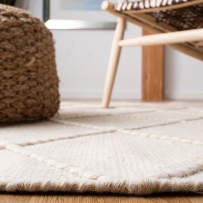 Beige and Ivory Handmade Wool Tufted Shag Rug, 4' x 6'