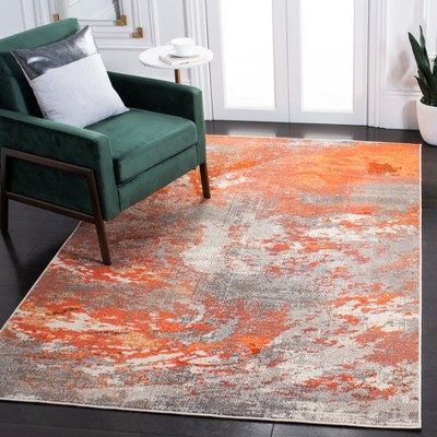 Gray and Orange Abstract 4' x 6' Synthetic Area Rug