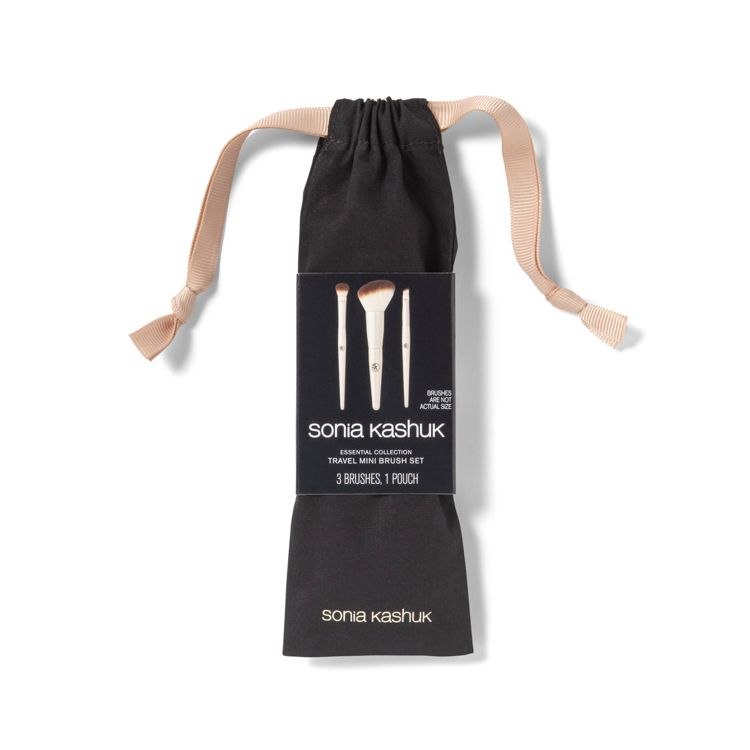 A black pouch with a beige ribbon containing a travel mini brush set, featuring three brushes displayed on the packaging.