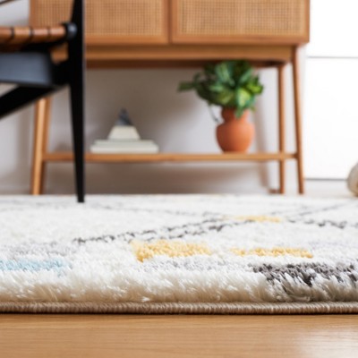 Ivory and Grey Moroccan Diamond 8' x 10' Synthetic Area Rug