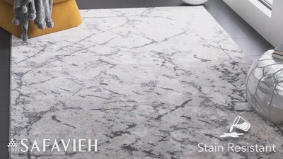 Ivory and Gray Abstract Square Synthetic Area Rug