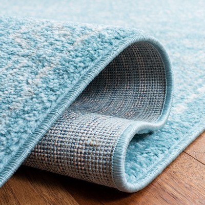 Aqua and Ivory Round Hand-Knotted Synthetic Rug