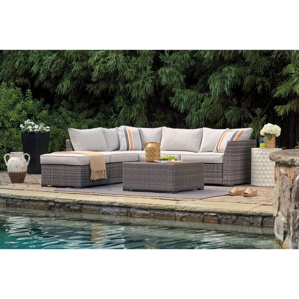 4pc Cherry Point Loveseat Sectional Ottoman and Table Set Gray Signature Design by Ashley