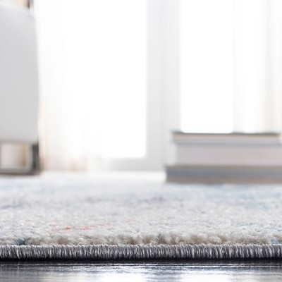 Ivory and Dark Blue Abstract 6' x 9' Washable Rug