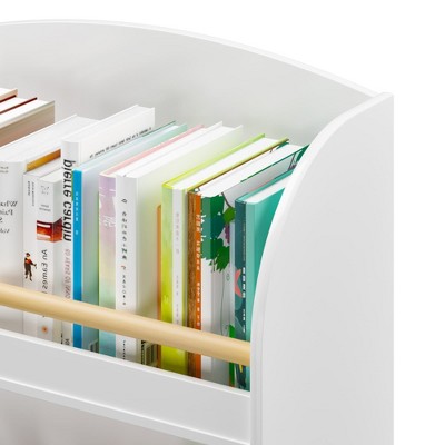 Close-up of the bookshelf side with books stored and curved white panel