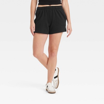 Women's Leisure Studio Mid-Thigh Fleece Shorts - Universal Thread™ Black S