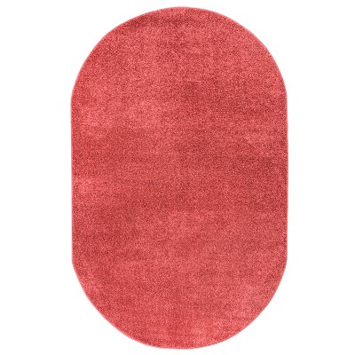 Red Oval Reversible Synthetic Area Rug 6'2" x 9'