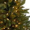 5ft. Pre-Lit Artificial Porch Christmas Tree with 200 LED Lights & 497 Branches in Decorative Planter – Charming X-Mas Tree - 4 of 4