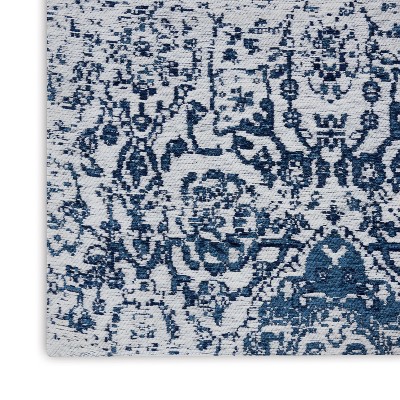 Ivory and Navy Medallion Synthetic 4' x 6' Area Rug