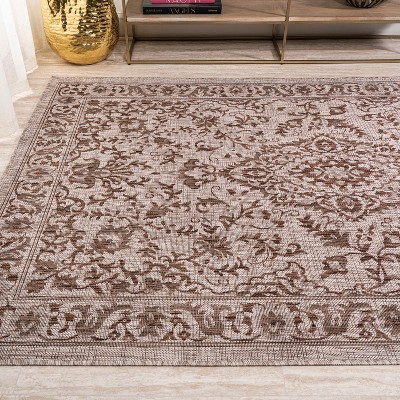 Ivory and Brown Medallion 8' x 10' Synthetic Rug
