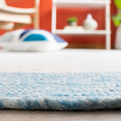 Ivory and Blue Round Braided Wool Area Rug, 5' x 5'