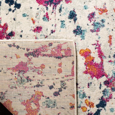 Ivory and Red Speckled Print Synthetic Area Rug