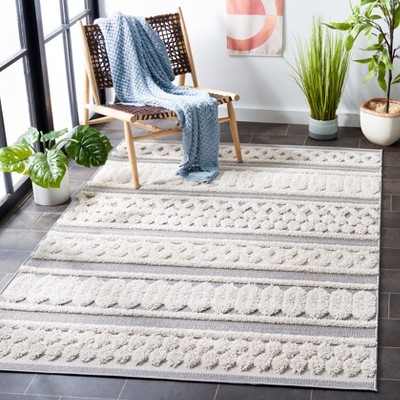 Ivory Elegance 5' x 7' Tufted Synthetic Area Rug for Indoor/Outdoor