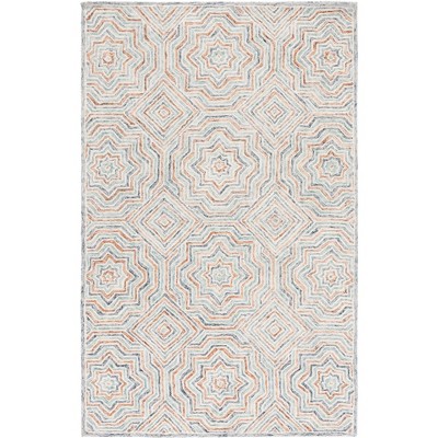 Capri 4' x 6' Blue and Rust Hand-Tufted Wool Area Rug