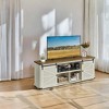 Farmhouse TV Stand for 75-Inch TVs with Sliding Barn Doors, 70 Inch Entertainment Center with Charging Station and Adjustable Shelves, Rustic White - 2 of 4