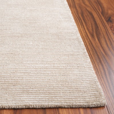 Ebony EBN950 Handmade Tufted Rug - Safavieh