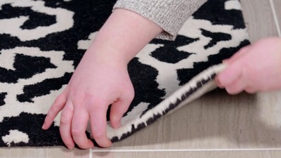 Black and Ivory Hand-Tufted Wool 6' x 9' Area Rug