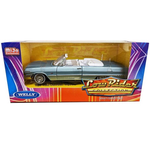 1963 Chevrolet Impala Convertible Lowrider Light Blue Met. w/White Interior  1/24 Diecast Model Car by Welly