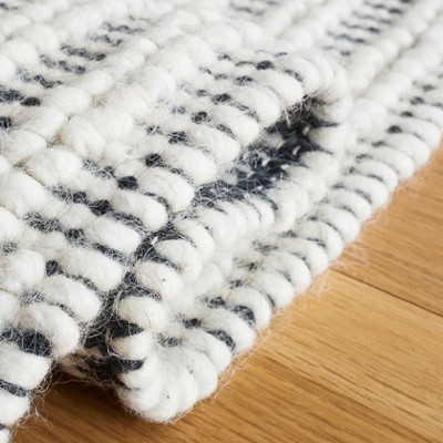 Handwoven Black and Ivory Wool 6' x 9' Area Rug