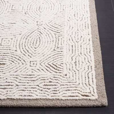 Ivory and Beige Abstract Hand-Tufted Wool Rug, 5' x 8'