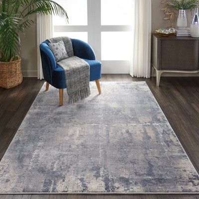 Abstract Grey and Beige Synthetic 5'3" x 7'3" Area Rug
