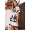 Amaryllis Women’s V-Neck Short Sleeve Mini Dress Black Contrast Trim Tiered Hem Bold Pattern Loose Fit - 4 of 4