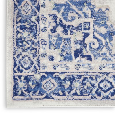Ivory Blue Floral 8' x 10' Reversible Synthetic Area Rug