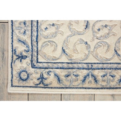 Ivory and Blue Rectangular Synthetic Area Rug